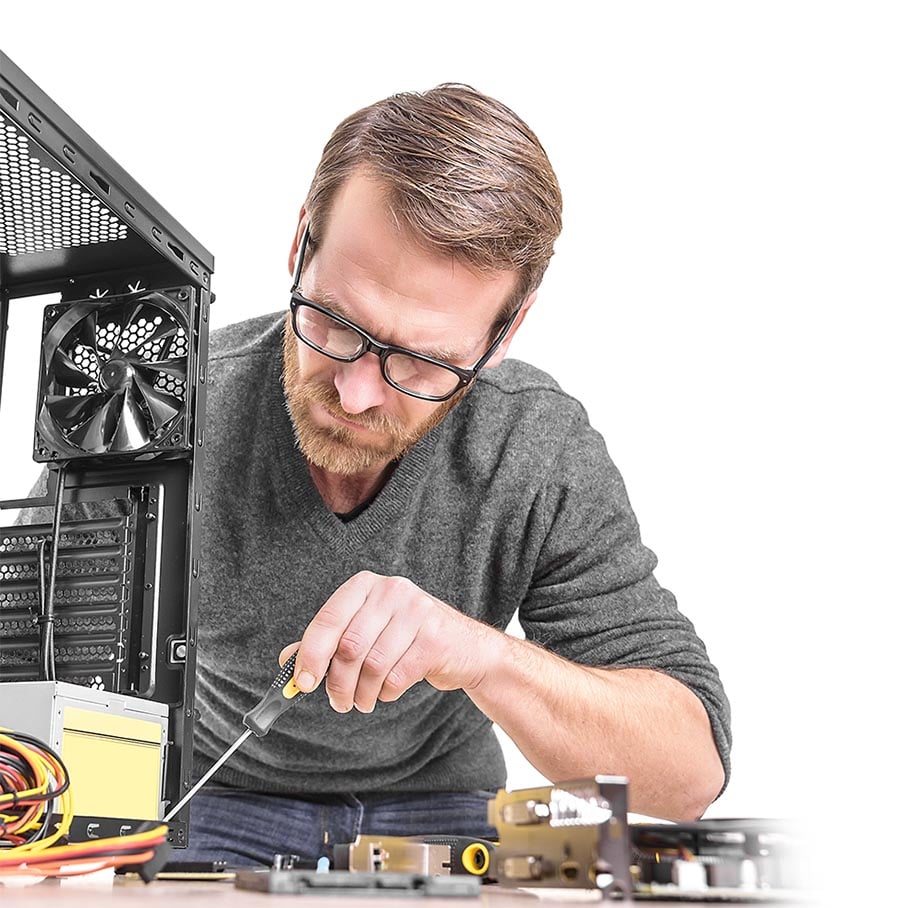 computer technician replacing a power supply and adding memory to a desktop computer